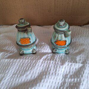Ceramic wood burning stove salt and pepper shakers